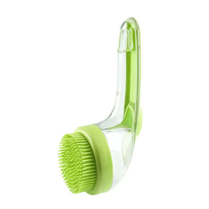 Green 2-in-1 pet bath brush with shampoo dispenser